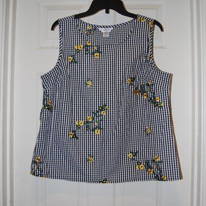 Sleeveless black and white checked top with floral